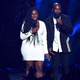 NEW YORK, NY - JULY 11: Co-Founder of Black Lives Matter Alicia Garza (L) and activist/writer/organizer Darnell L. Moore speak onstage during the VH1 Hip Hop Honors: All Hail The Queens at David Geffen Hall on July 11, 2016 in New York City.